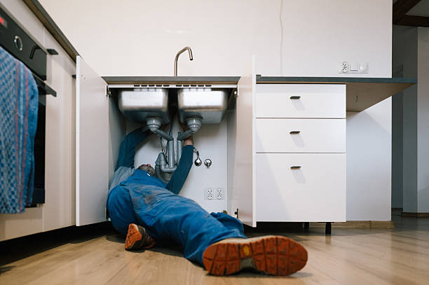 Professional Emergency Plumber technician working in Salem, MA